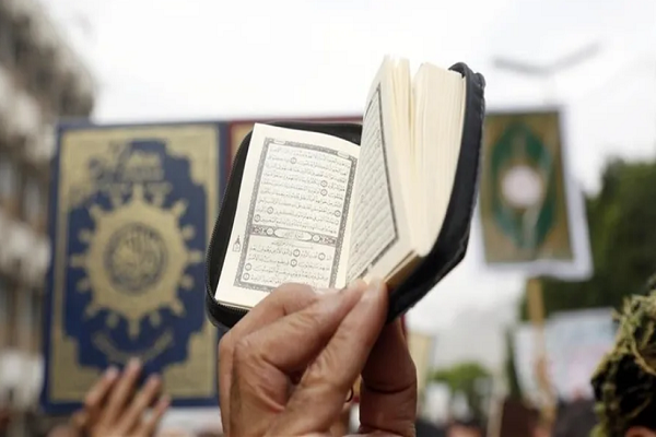 البرلمان الدنمارکی یمنع الإساءه إلى القرآن
